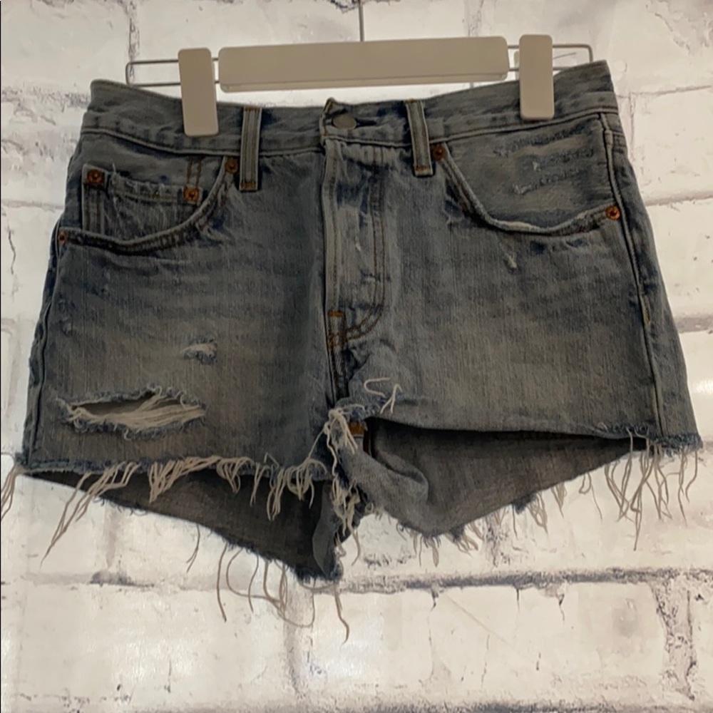 Light blue ripped denim jean shorts